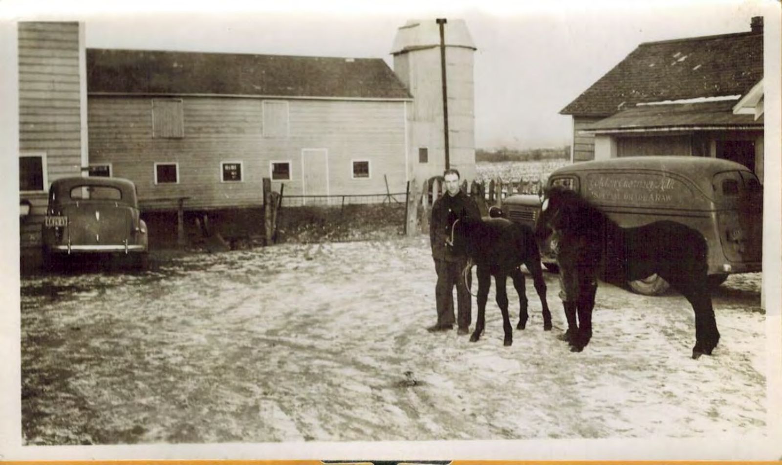 Edward Kleinke standing before the main barn complex, before the shed addition was built (courtesy Bethlehem Town Historian).